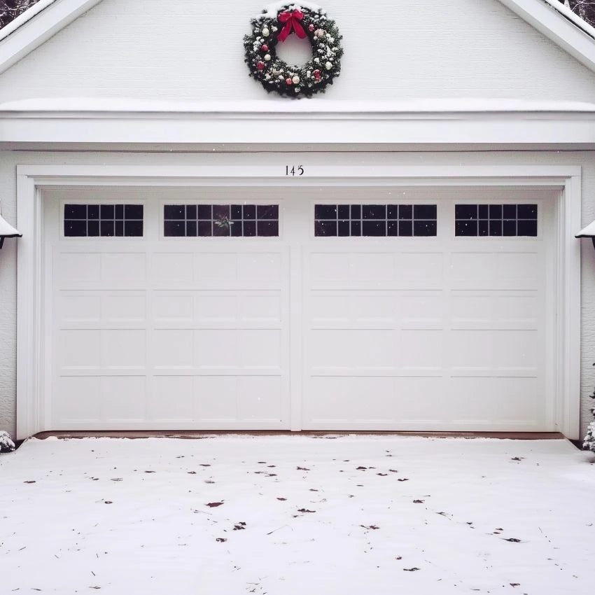 Christmas Holidays garage door cover on a garage door, showcasing festive holiday decorations and lights before installation.